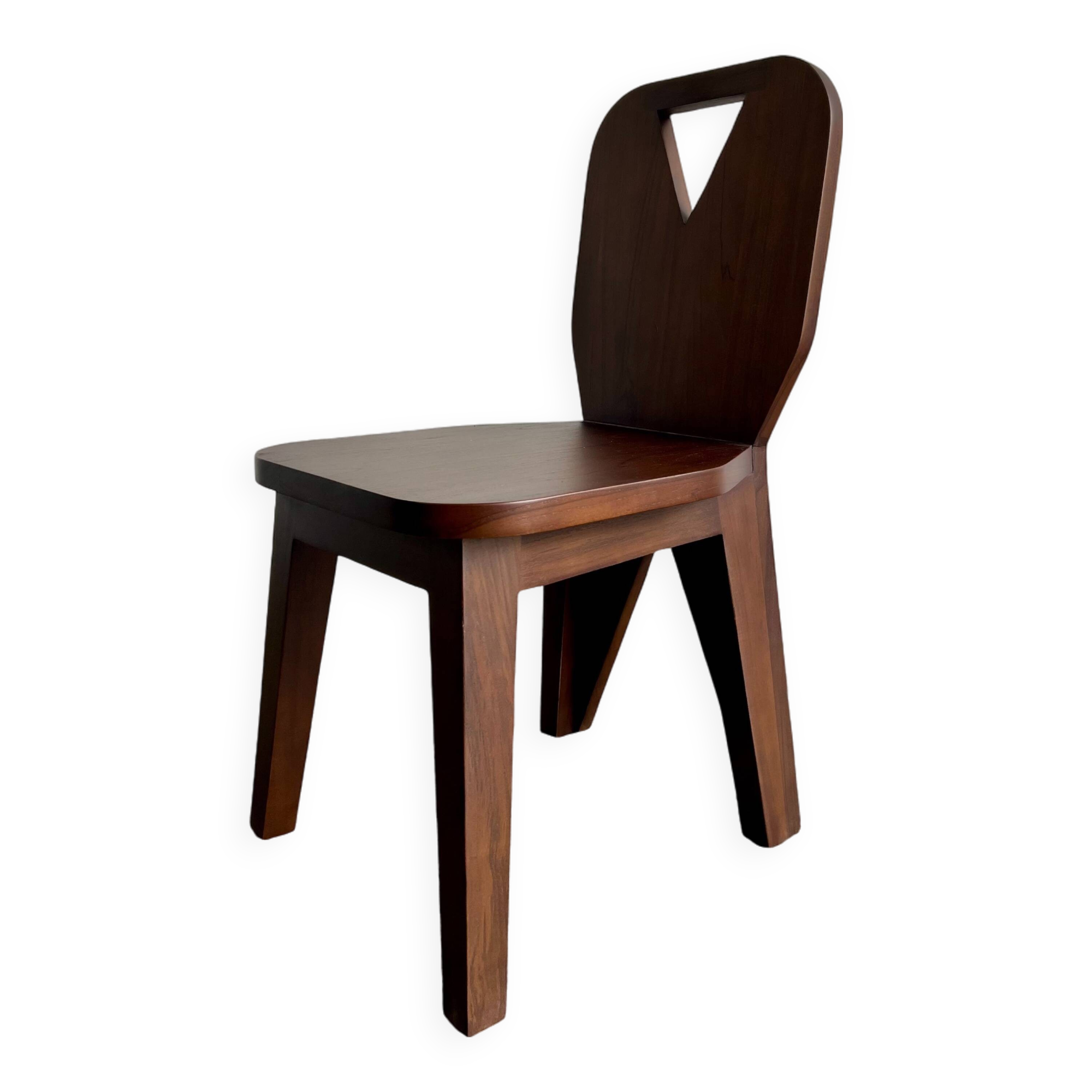 Retro brutalist chair in dark solid wood