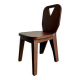 Retro brutalist chair in dark solid wood