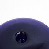 Blue glass saucer candle holder