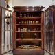 Pair of Empire period mahogany bookcases with flame pattern from the 19th century.