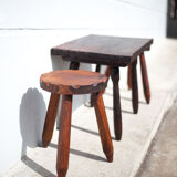 Set of coffee table and 2 carved wooden stools, brutalist