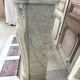 Large white marble fireplace in Louis XV style, 19th century.