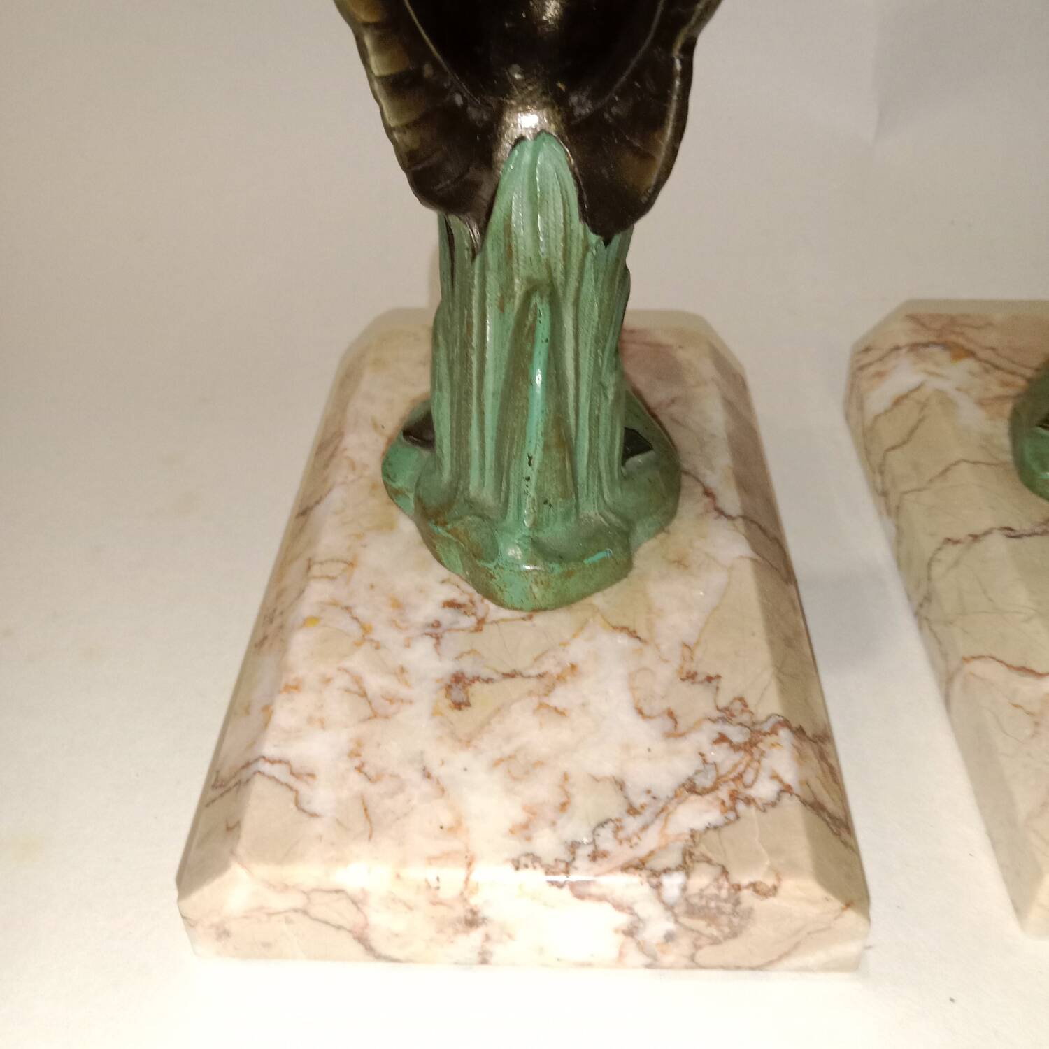Art Deco bookends with metal swans, double patina and marble base.