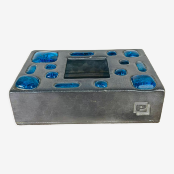 Decorative metal box and blue glass