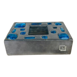 Decorative metal box and blue glass