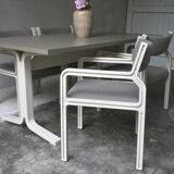 Dining table set and 4 dining chairs by Pierre Mennen for Pastoe.