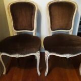 A pair of Louis XV style armchairs in wood and velvet fabrics