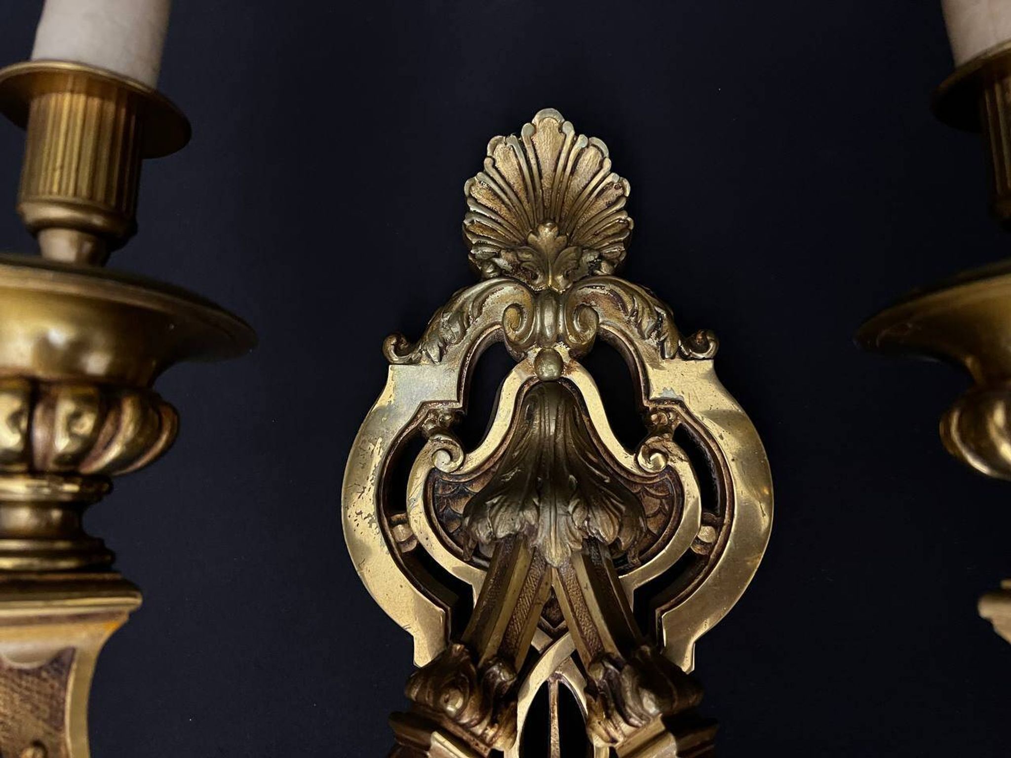Large pair of gilt bronze wall sconces in the Louis XVI style.