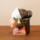 Tobacco pot woman's head in folk headdress