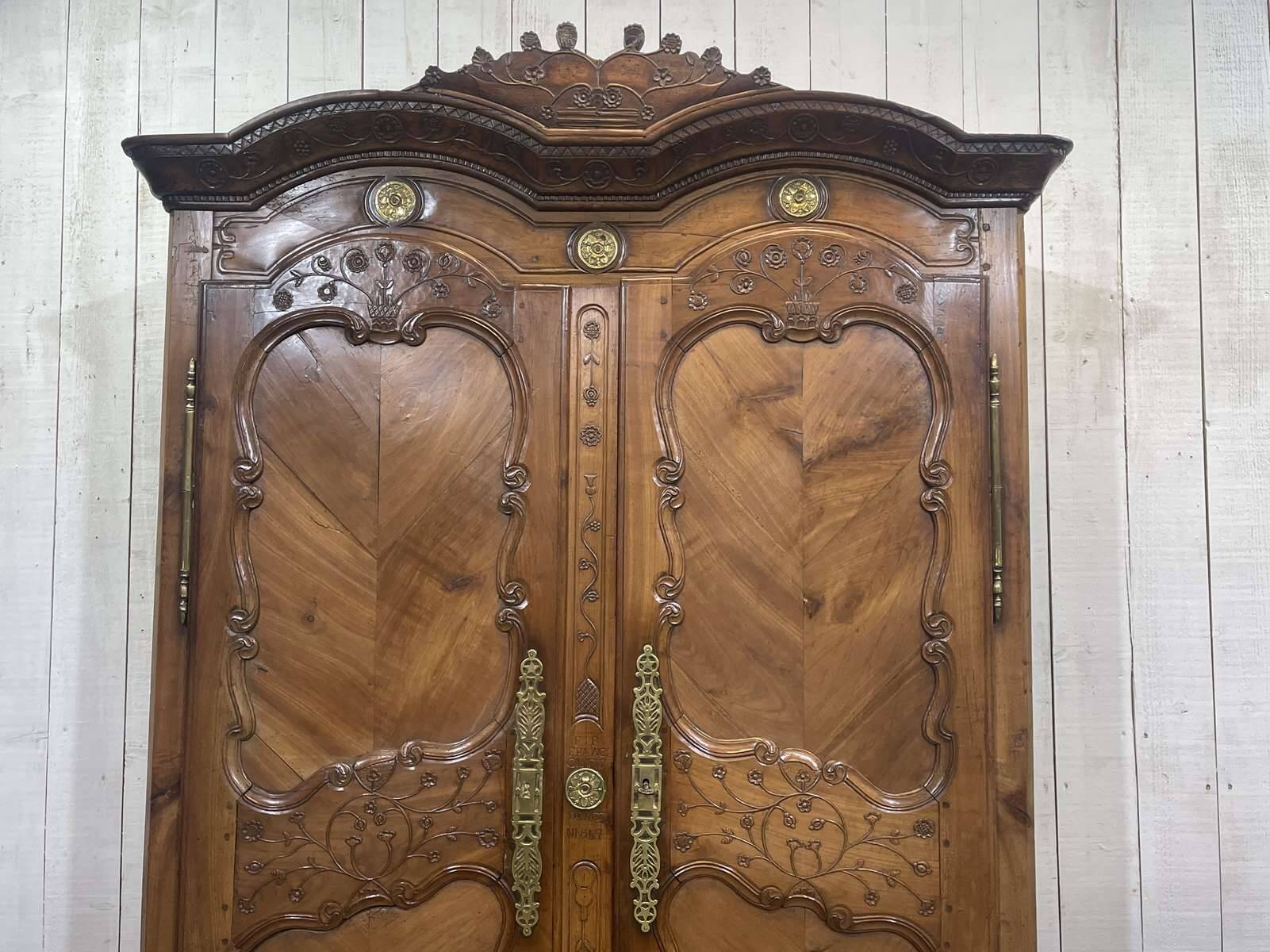 Wedding armoire from Rennes dated 1857 and signed François fils Denot.