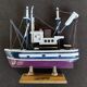 Wooden trawl fishing boat