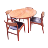 Roundtable with extension cords and chairs from the 1960s
