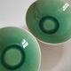 Two celadon crackle effect deep plates