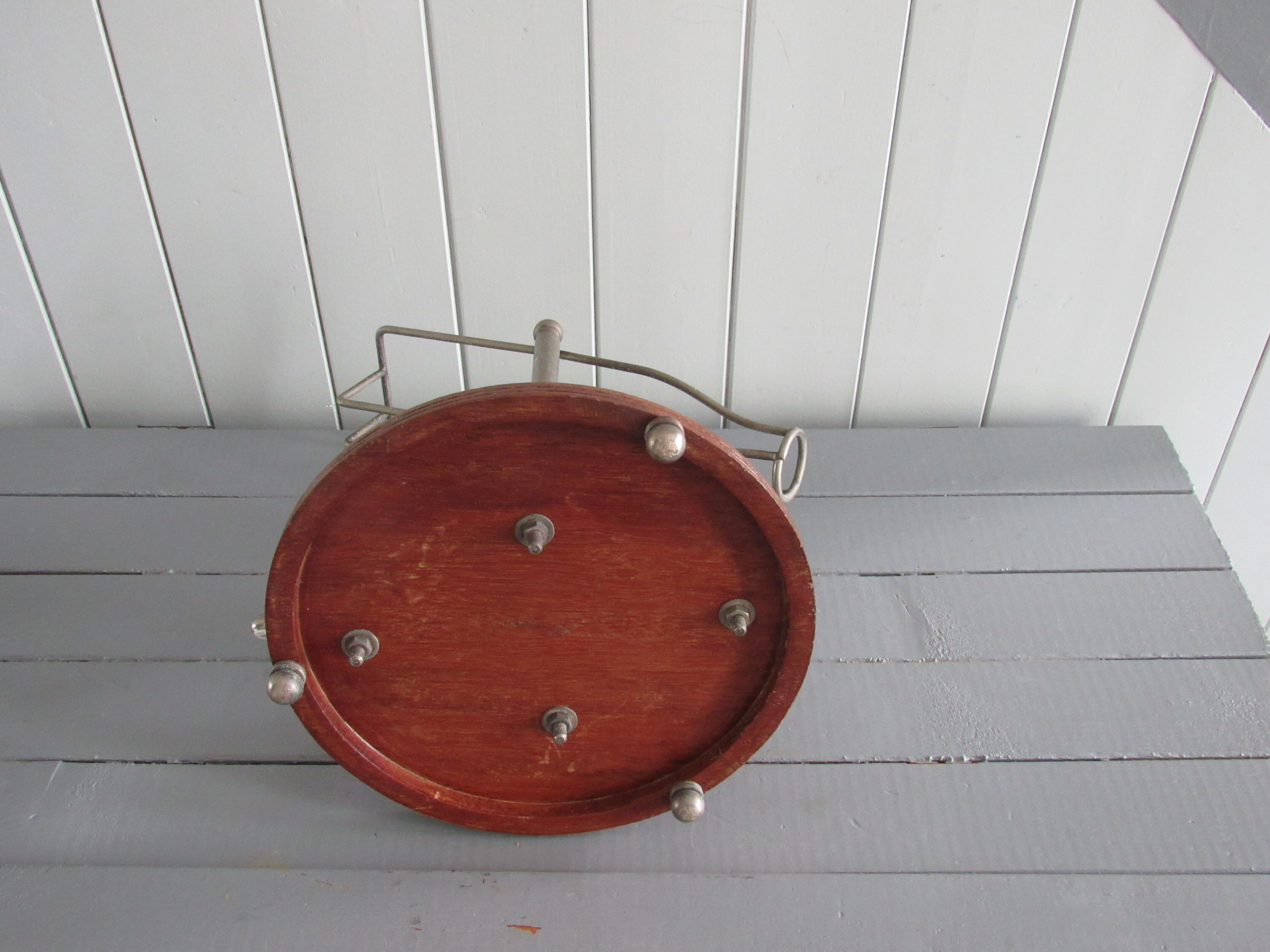 Old mechanical wine decanter on wooden base
