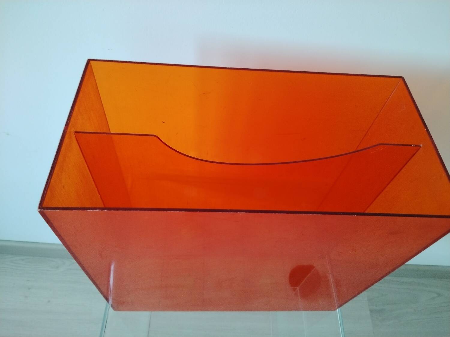 Vinyl magazine holder in orange plexiglass
