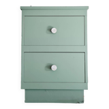 Old chest of drawers with two green drawers