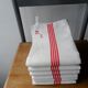 Set of 6 antique tea towels lined with ml