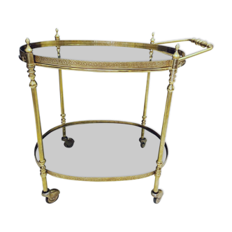 Trolley on casters in brass and smoked glass