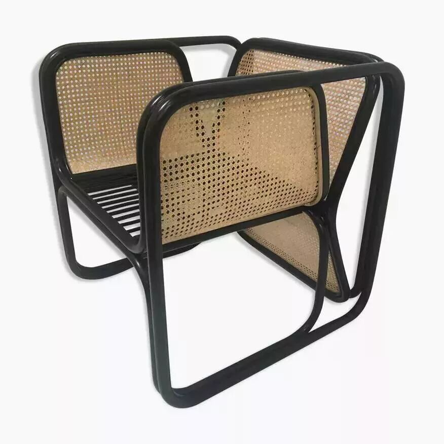 Armchair in black lacquered rattan and natural cane