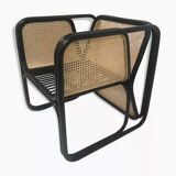 Armchair in black lacquered rattan and natural cane