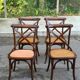 4 bistro chairs with curved wooden backs and cross braces / Crossback