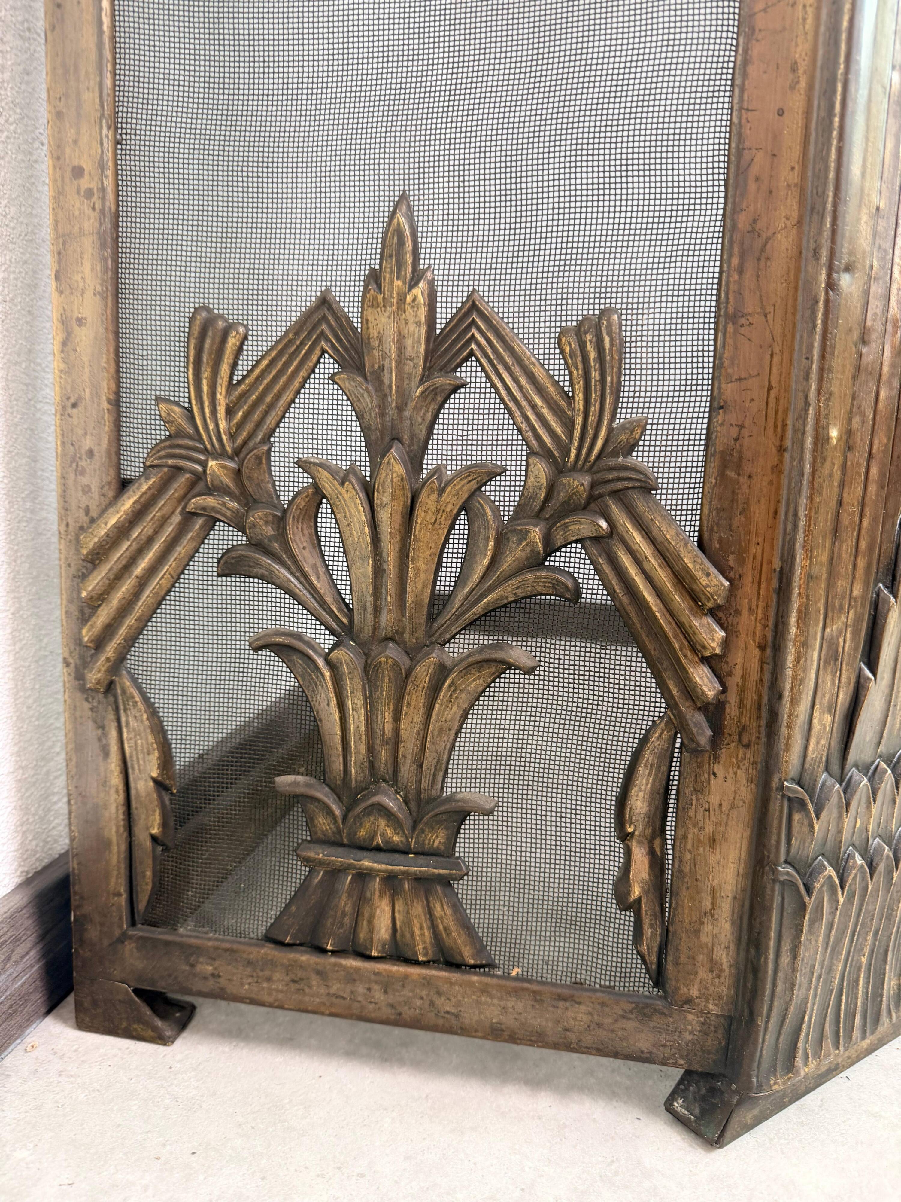 Corner fireplace screen in brass attributed to Dagobert Peche