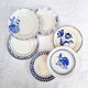 Old flat plates mismatched in earthenware