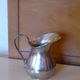 Coffee set in silver metal composed of 3 pitchers, Millan Freres, Paris