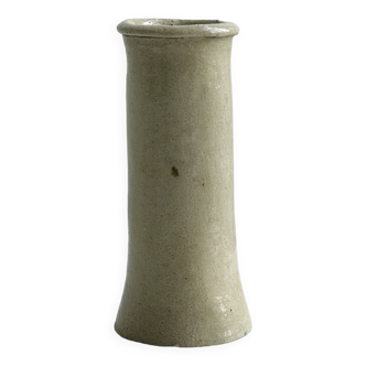 Minimalist beige ceramic vase.