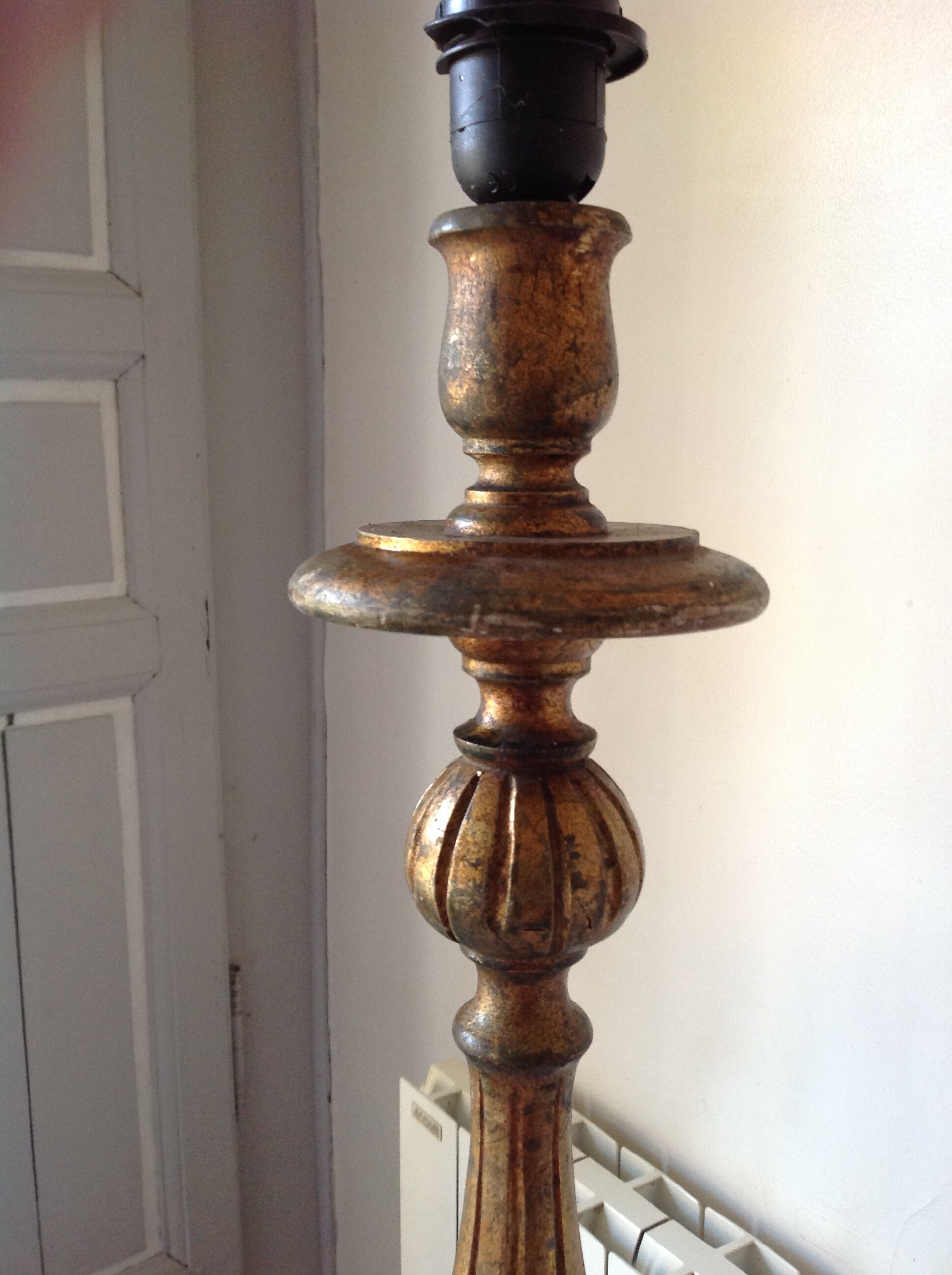 Old chandelier in gilded wood