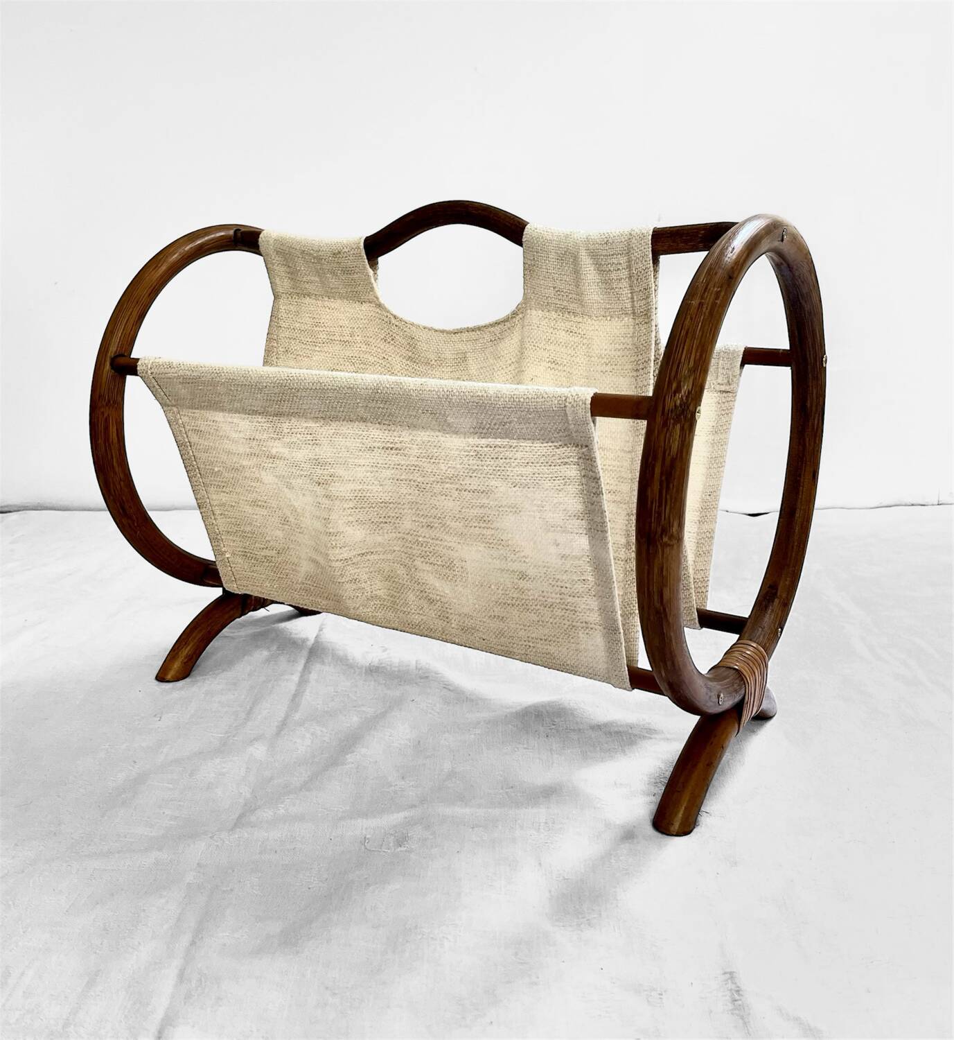 Vintage curved rattan magazine rack – 1960s