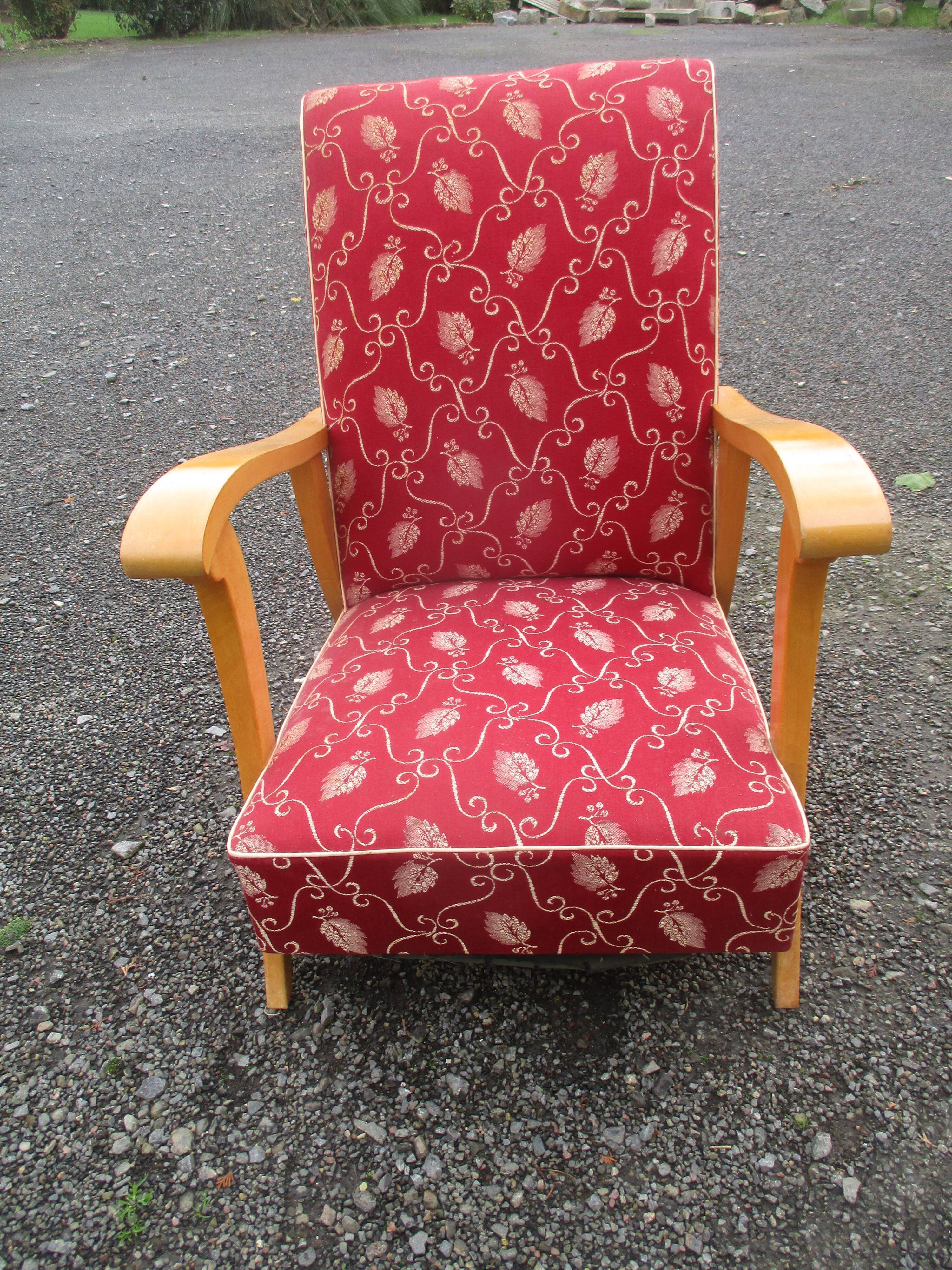 Scandinavian armchair in wood and red fabric