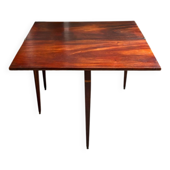 Folding table, dark wood console.