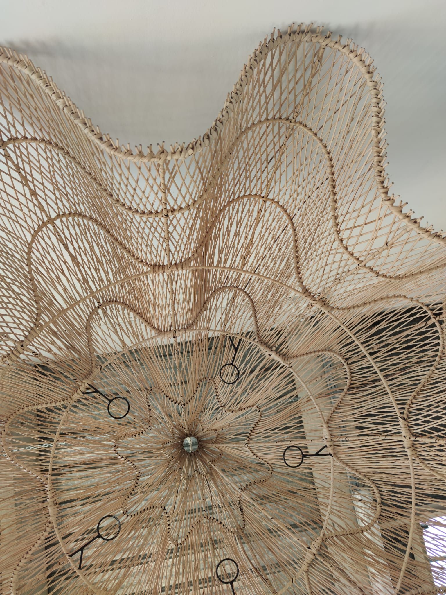 Huge rattan suspension in the shape of a corolla H:1m; D: 1m50