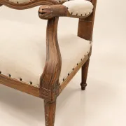 Louis XVI period canapé – Model with eel heads – Carved walnut