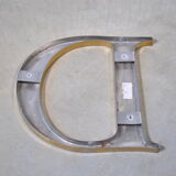 Letter sign in gold metal "D" 1980
