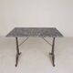 Bistro table with a marble top on a cast iron frame, 1930s.
