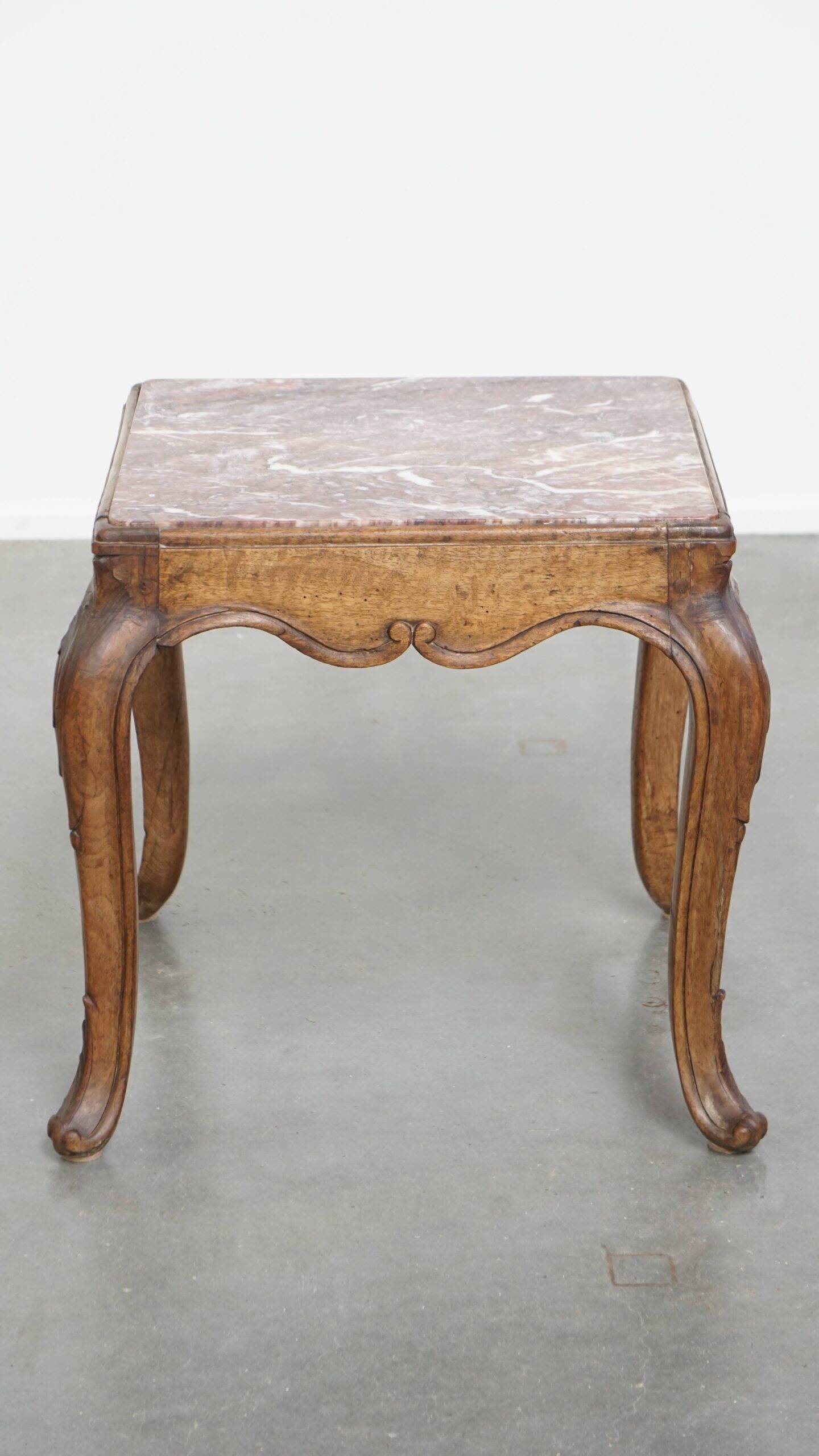 French late 18th century side table with a wooden frame and a marble top