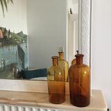 Duo of amber apothecary bottles