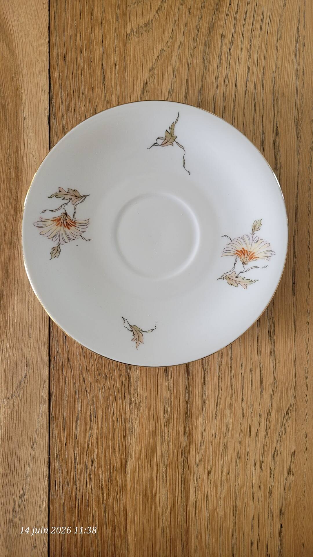2 large antique cups and their saucers