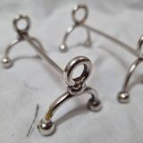 6 silver Christofle knife holders