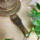 Ancient cave lamp in gilded bronze