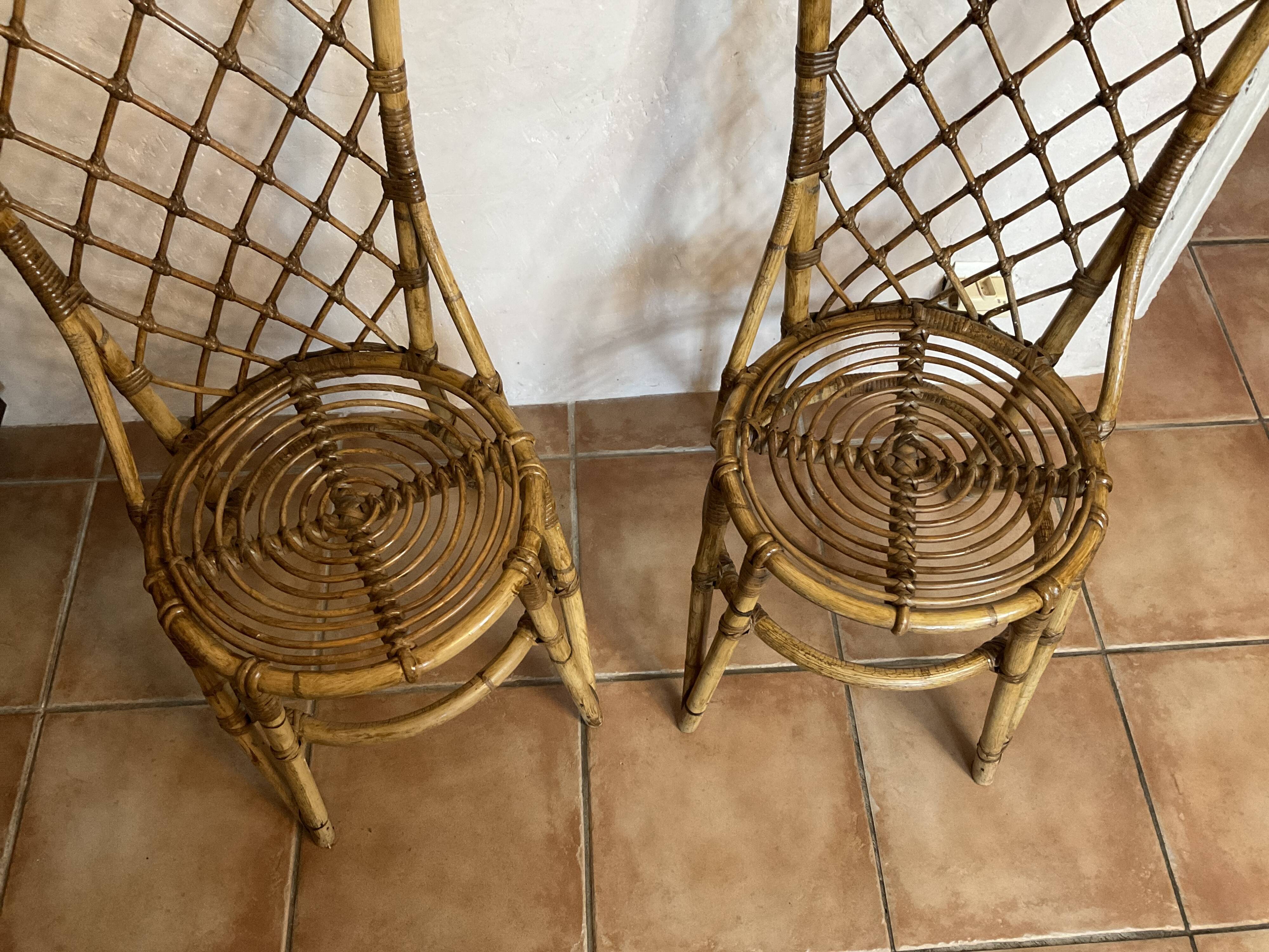 Pair of vintage rattan chairs Louis Sognot