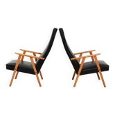 Paire de fauteuils scandinaves à dossier haut en simili cuir des années 1950-60.