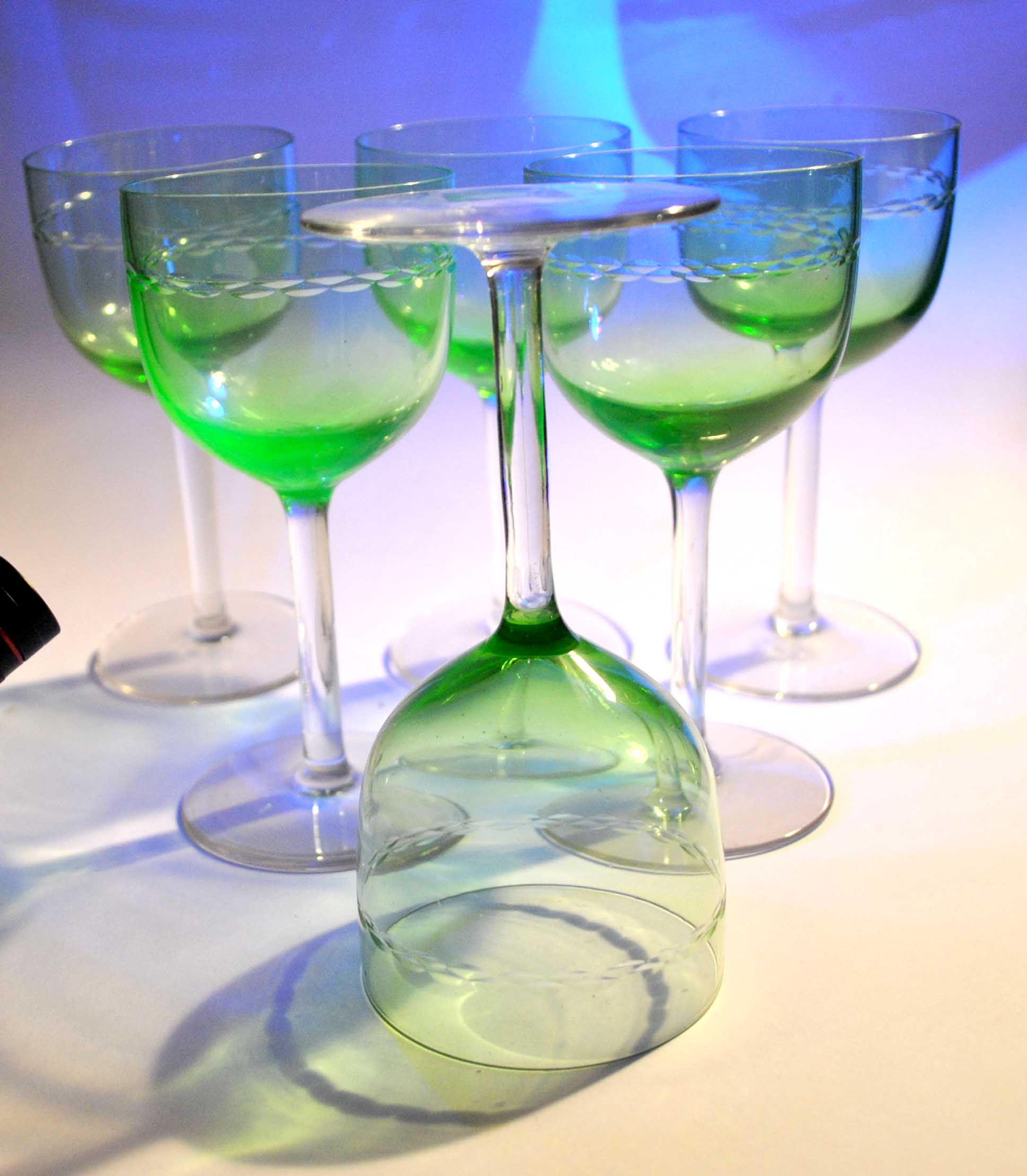 Series of 6 foot glasses in ancient green uranium glass