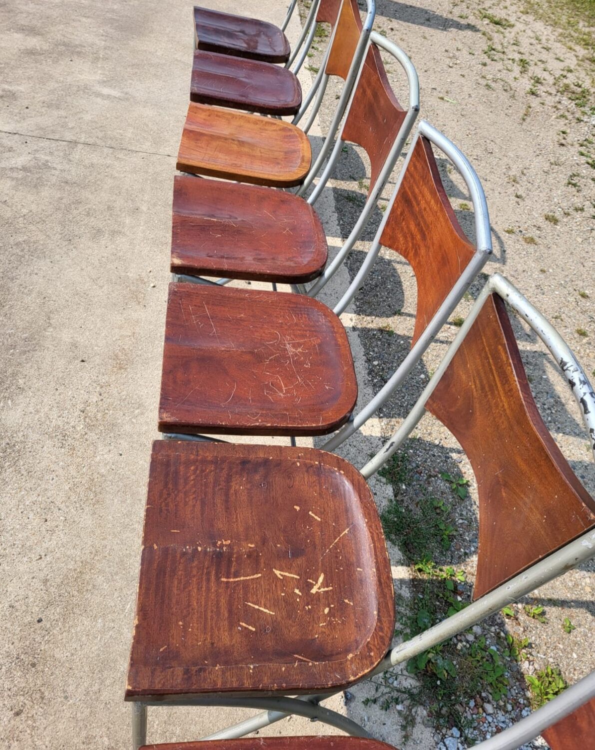 Set of 10 tubular oak bistro dining chairs in vintage industrial style.