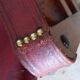 Leather and wood relaxed armchair