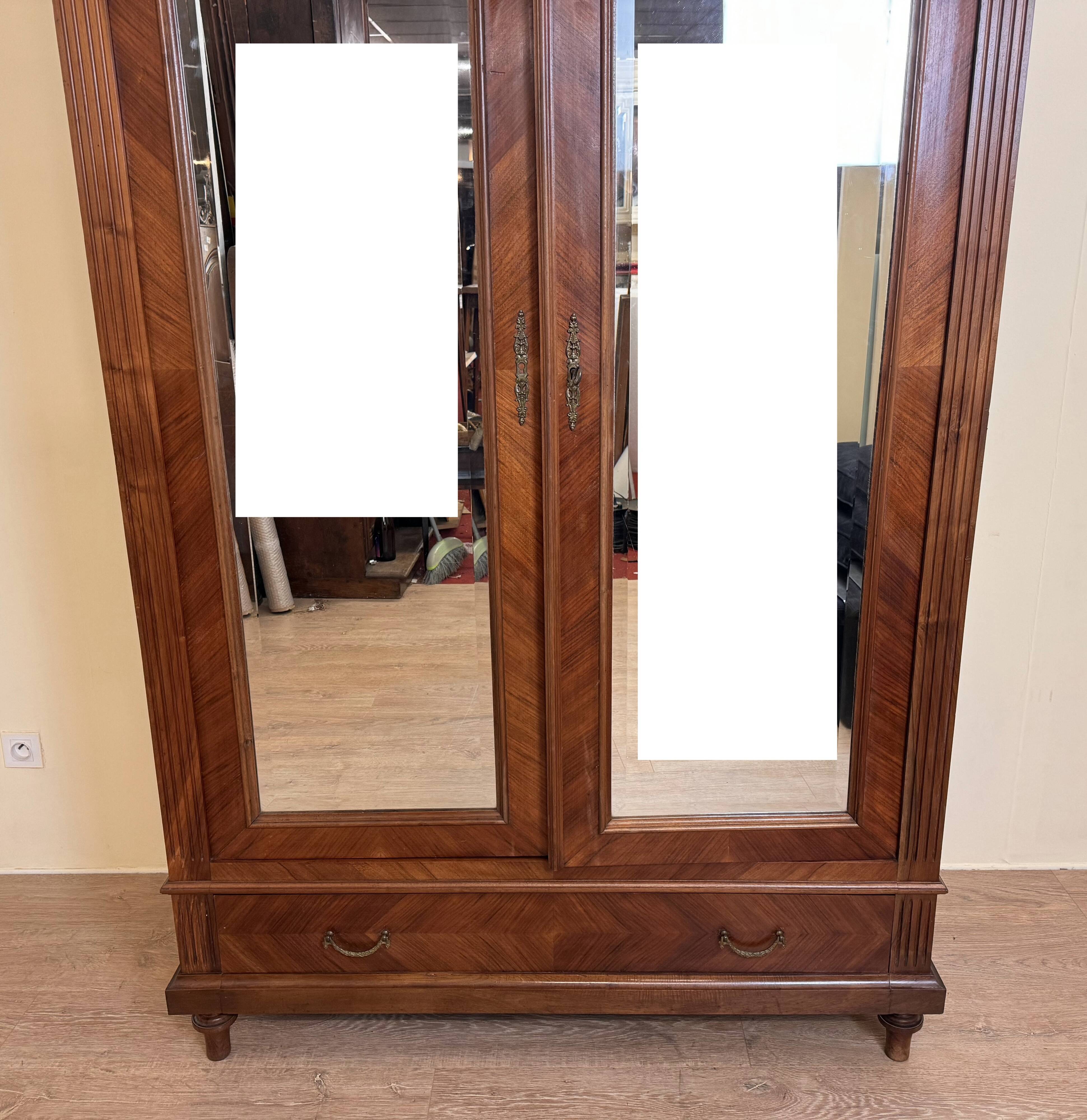 Louis XVI style mirror cabinet in walnut circa 1880