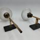 Pair of brass and glass wall lamps