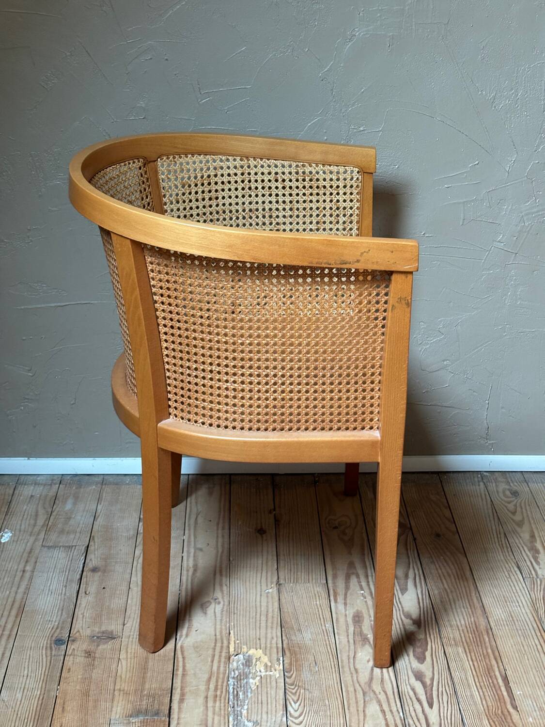 Wooden and cane cabriolet armchair